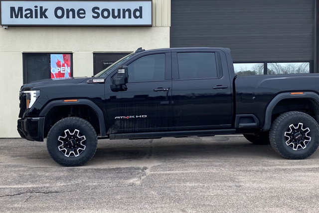 2024 GMC 2500 AT4 with professional window tint in North Bay